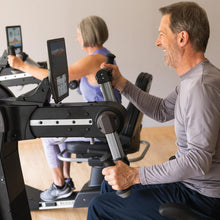 Load image into Gallery viewer, NuStep UE8PRO Upper Body Ergometer, Black, Low-Impact Exercise, Seated, Standing or Direct Wheelchair Accessibility, 360-Degree Swivel Seat, Engaging Programs, &amp; Compatible with NuStep Wellness App
